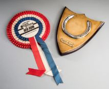 A racing plate worn by Red Rum when winning his historic third Grand National in 1977,