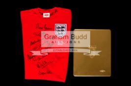 A signed limited edition Umbro red England No.