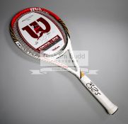 Roger Federer signed tennis racquet, signed in black marker pen to the white handle,