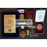 A collection of Olympic/Athletics & Sporting medals and badges, including participation, prize,