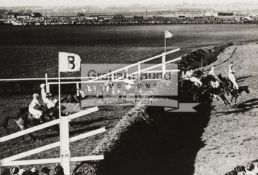 A group of six large b&w photographs featuring Grand Nationals between 1929 and 1938,