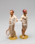 A rare pair of 1930s celluloid figurines of tennis players,