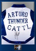 Arturo "Thunder" Gatti signed boxing robe, in white and blue silk, reverse mounted,