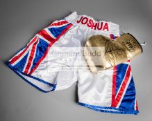 Anthony Joshua signed boxing glove and trunks, a gold left-hand V.I.