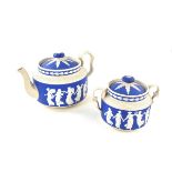 A Late Victorian Copeland blue and white jasper earthenware matching teapot and twin handled sugar