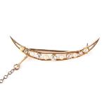10 ct yellow gold pearl and diamond crescent brooch.
