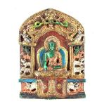 A painted composite Buddha Image, Tibetan or Mongolian, 20th century. Painted with gilt highlights.