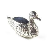 A George V silver duck pin cushion. Mark of Boots Pure Drug Company, Birmingham 1910. 2.3 in (5.
