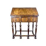 A late 17th century European walnut and oak gate legged bureau, probably Dutch.