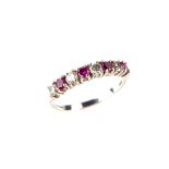 18 ct white gold ruby and diamond half eternity ring.
