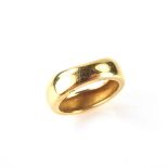 18 ct yellow gold ring. Designed with one shaped edge. Signed Cartier. Ring size M 1/2. Weight 5.