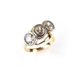 Yellow gold three stone diamond ring, tests 18 ct.