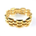 18 ct yellow gold link bracelet. Composed of interlocking oblong links. Length 168 mm.