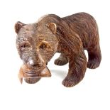 A large Swiss Black Forest carved wood bear, 20th century.