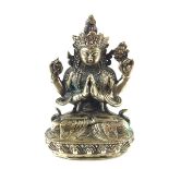 A Tibetan or Chinese silvered metal deity figure. 3.9 in (9.8 cm) height.