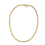 Yellow gold chain necklace. Designed as box chain links, each set with seven gold spheres.