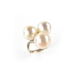 White metal three stone pearl ring. Ring size L. Weight 6.3 grams. In ring box.