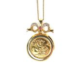 9 ct yellow gold diamond and ruby half sovereign pendant necklace.