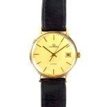 Garrard 9 ct yellow gold date watch. Quartz movement.