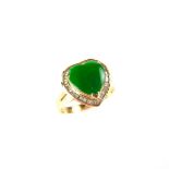 18 ct yellow gold jade and diamond ring. The heart shaped jade measuring approx.