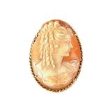 Yellow gold shell cameo brooch pendant. Depicting the bust of a woman in a rope twist border.