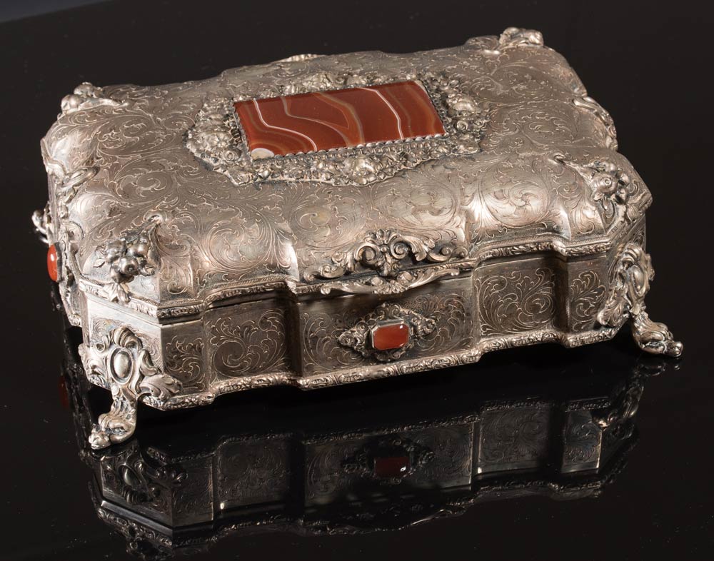 Silver trinket box with carnelian cabochons.