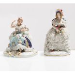 Capodimonte, pair of polychrome porcelain figurines "Ladies", 20th Century.