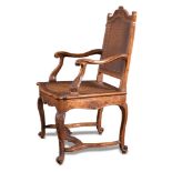 Carved walnut fauteuils with caned back and seat, X18th Century.