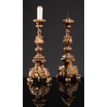 Pair of carved, lacquered and gilt wood candlestick, 18th Century.