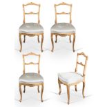 Set of four carved and gilt wood chairs, late 19th Century.