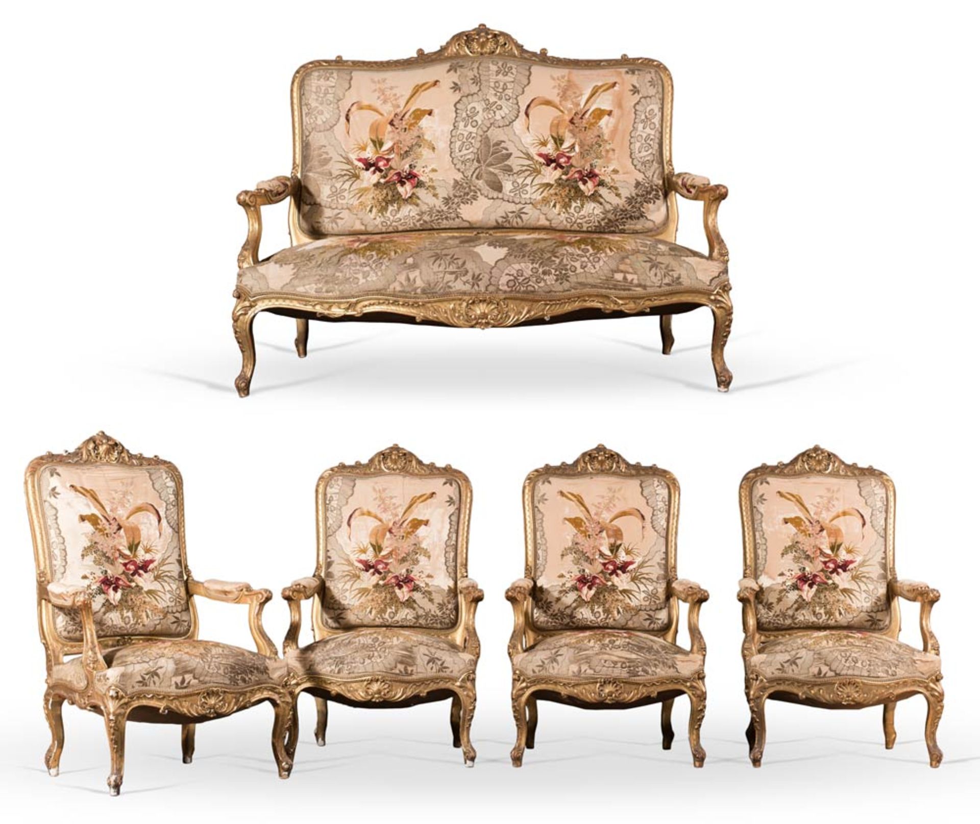 An elegant set of a sofa and four armcharis, France, 19th Century