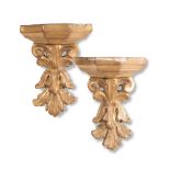 Pair of carved and giltwood small shelves, XIX sec.