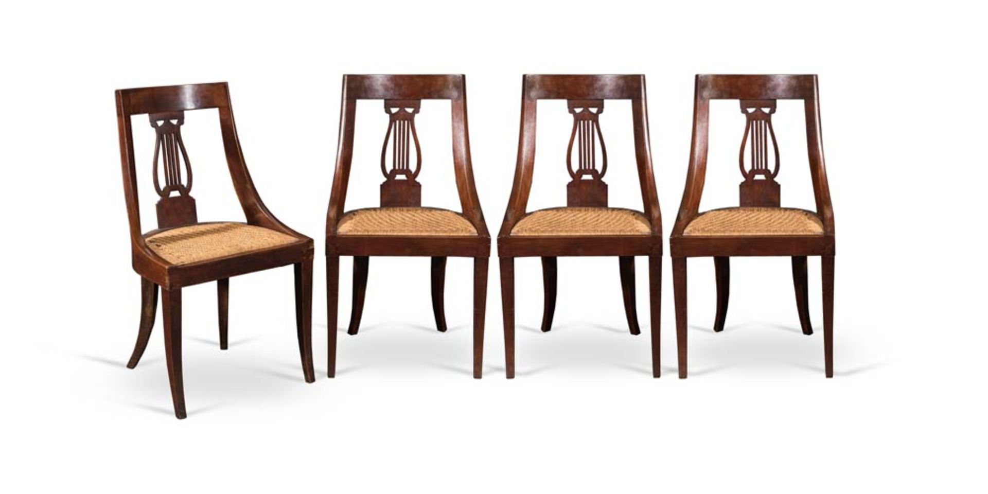 Four walnut 'a gondola' chairs, Northern Italy, first half of 19th Century.