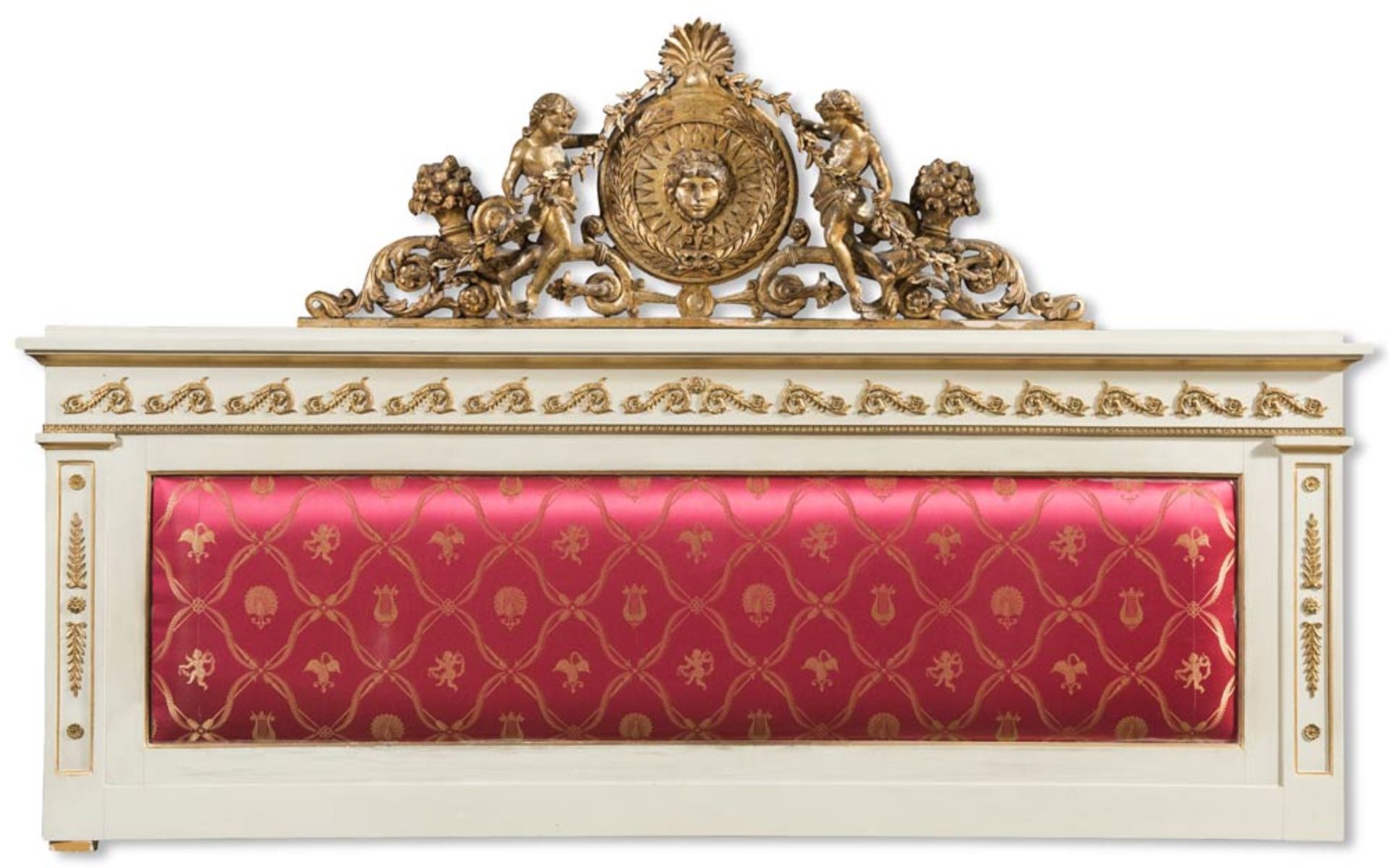 Lacquered wood bed head with carved and giltwood frieze, 20th Century.