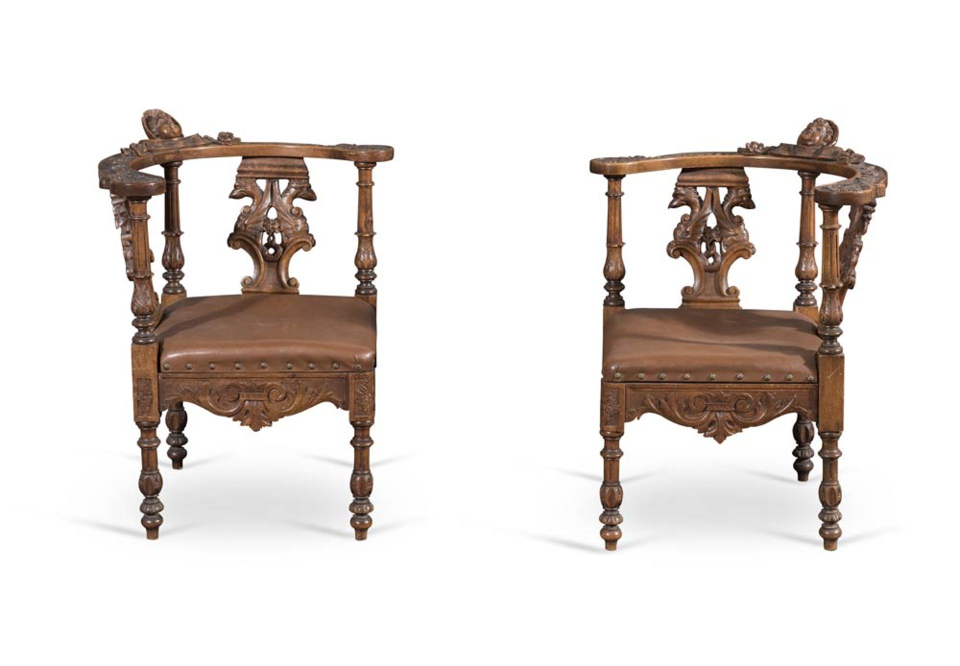 Pair of walnut corner chairs, 20th Century.