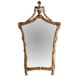 Carved and giltwood mirror, early 20th Century, in style of 18th Century.