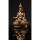 Gilt bronze figure of Padmasambhava, Tibet, 17th Century.