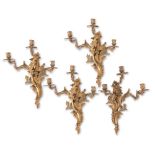 Four gilt bronze wall appliques, early 20th Century.