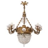 Brass sheet and crystal chandelier, early 20th Century.