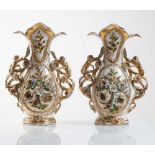 Pair of pocelain vases, France, Luigi Filippo period, half 19th century.