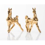 Zaccagnini, pair of gold ceramic sculptures, "Cavalli", 20th Century.