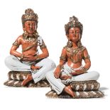 Pair of porcelain sculptures, "Figure Thailandesi sedute su fiore di Loto", Italy, 20 th Century.