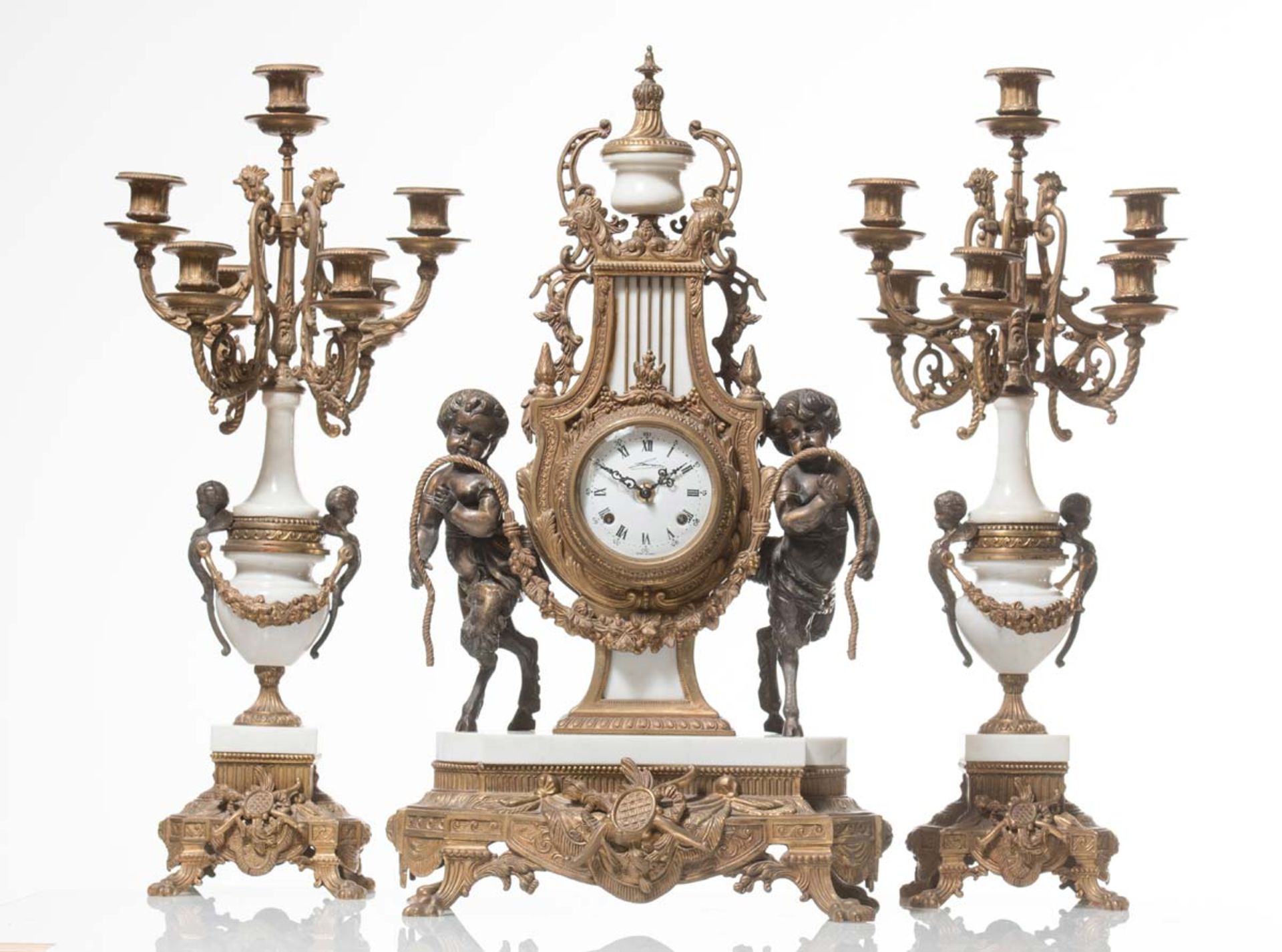 Three piece bronze and white marble Clock Set, Italy, 20th Century.