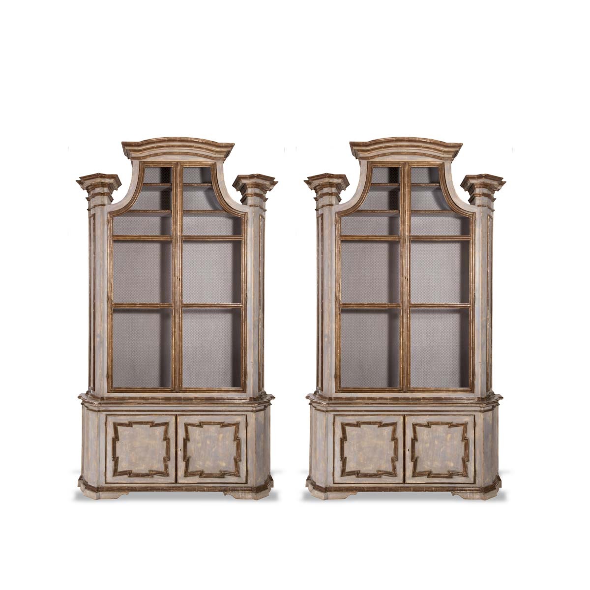 Pair of carved and lacquered bookcases, 20th Century.