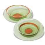 Pair of green and orange glass bowls, Murano, 80s.