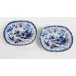 Pair of oval blue and red ceramic dishes, England, early 20th Century.
