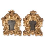 Pair of carved and gilt wood mirrors, late 17th Century.