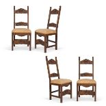 Group of four carved walnut chairs, 20th Century.