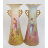 A pair of Royal Doulton painted vases by Arthur Leslie painted with elegant classical ladies in a