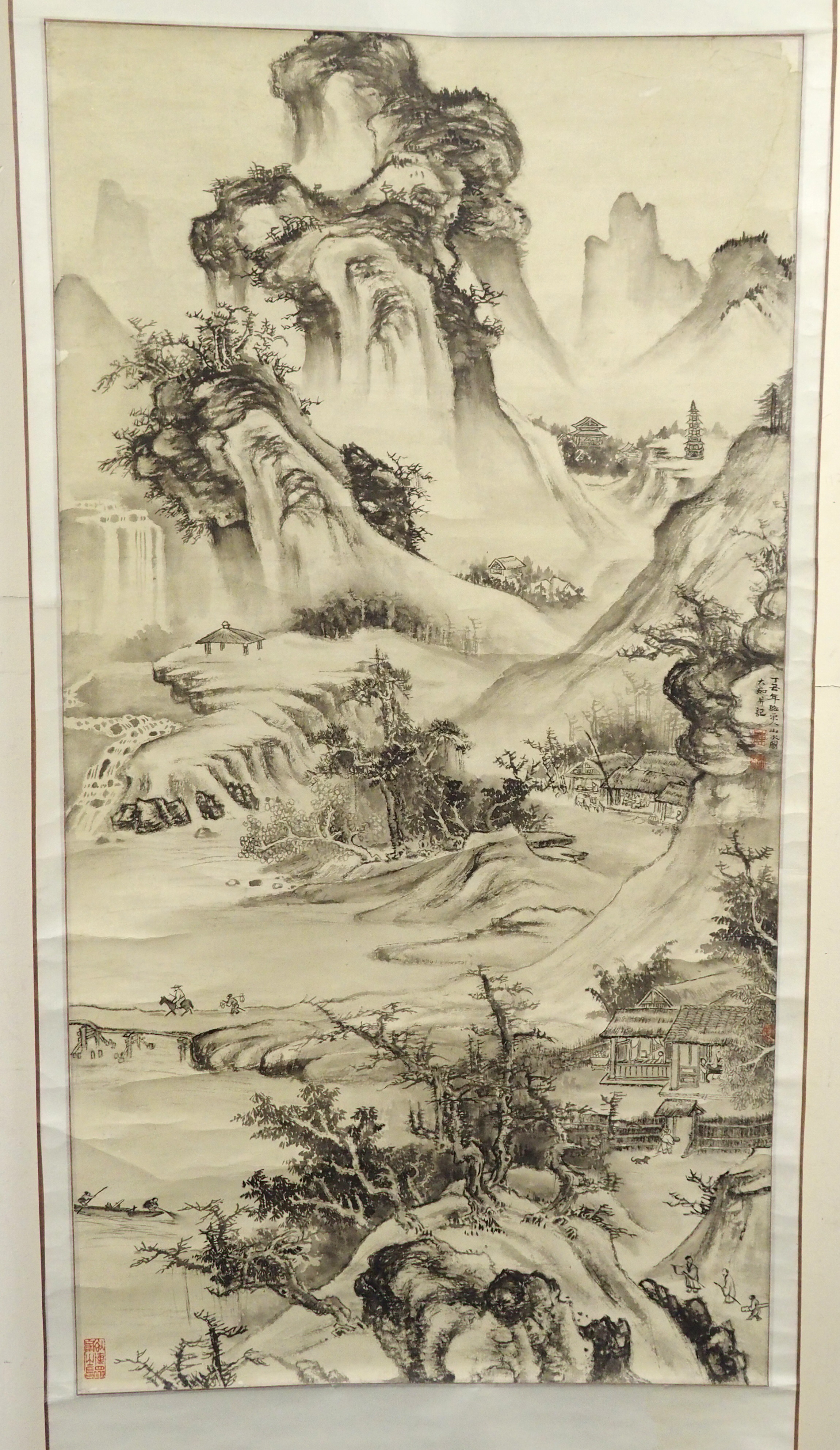 A Chinese scroll painting in the style of Guo Xi with an extensive mountainous landscape, 126 x